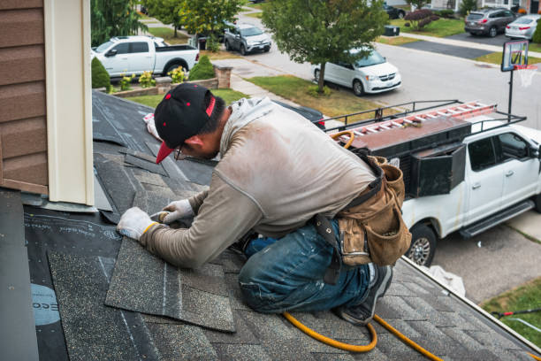 Professional Roofing technician working in Westwood, MA